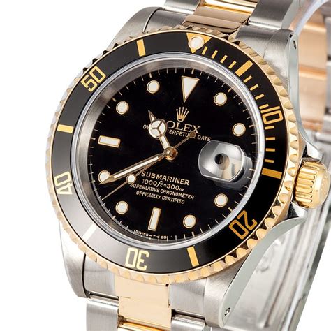 rolex submariner gold with black face|Rolex Submariner black dial.